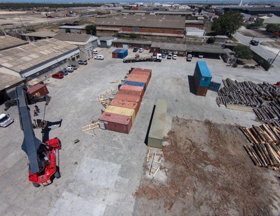 Aerial view of container stacks and reach stacker