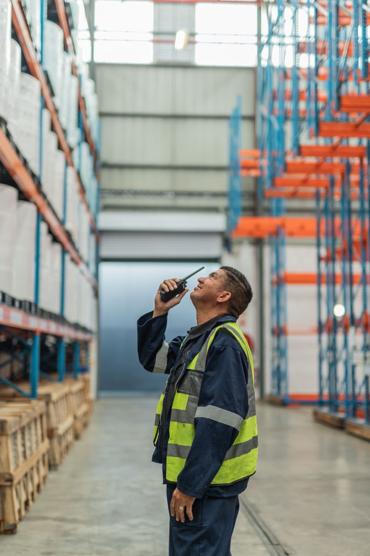 A JFM warehouse team member at the racking