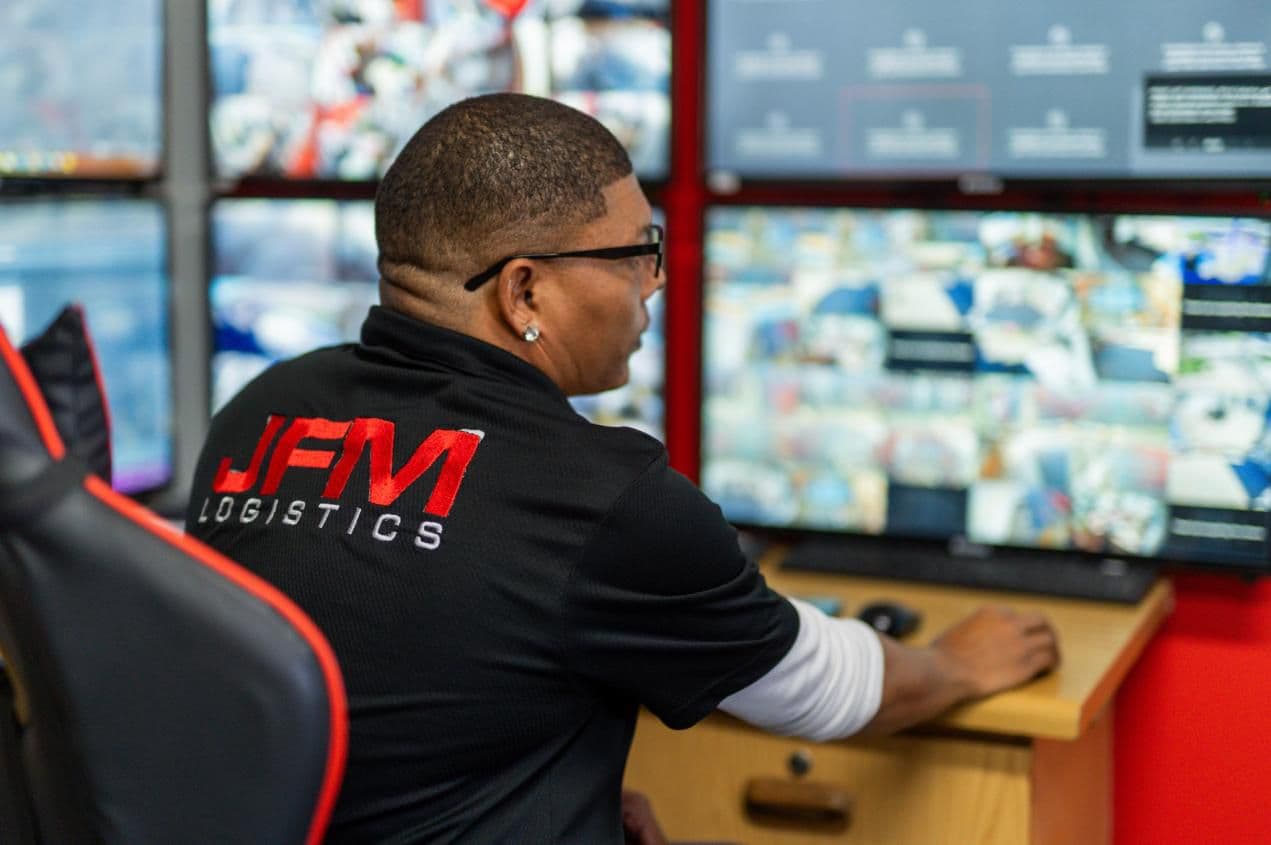 JFM control-room operator monitoring live camera feeds